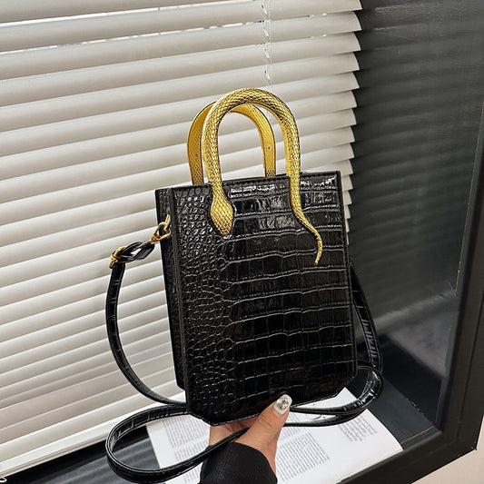 purse with snake handle